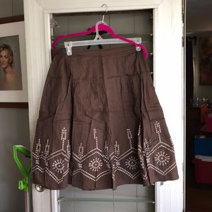 Brown a-line skirt with beige embroidery detailing